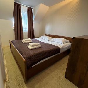 Posteľ alebo postele v izbe v ubytovaní GORGANY resort & SPA