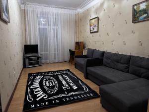 TV a/nebo společenská místnost v ubytování Apartments on Bolshaya Morskaya 65 + 1 fotografie