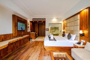 Postel nebo postele na pokoji v ubytování Airport Hotel Roomsity Pride