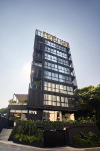 a large glass building with a nivek sign on it at HYPE STATES Cali in Cali +95 photos