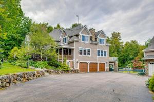 a large house with a driveway in front of it at Deck For Entertaining Belmont Group Getaway in Belmont