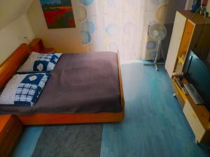Ένα ή περισσότερα κρεβάτια σε δωμάτιο στο Apartment auf zwei Ebenen