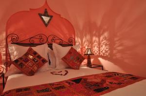 Cama o camas de una habitación en Riad La Famille