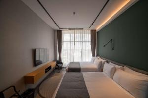 Aiden by Best Western Georgetown Guyana客房内的一张或多张床位