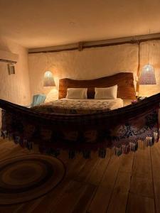 Ένα ή περισσότερα κρεβάτια σε δωμάτιο στο La Mofa Beach House