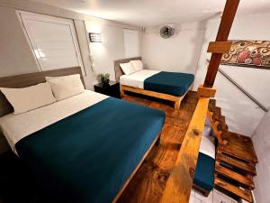Postel nebo postele na pokoji v ubytování Hotel del Refugio