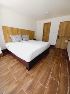 Postel nebo postele na pokoji v ubytování Aw Hotel Ariston Embassy