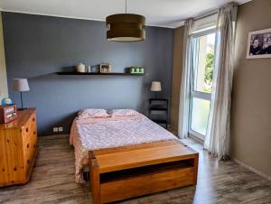 En eller flere senge i et værelse på Belle Maison de famille en Alsace