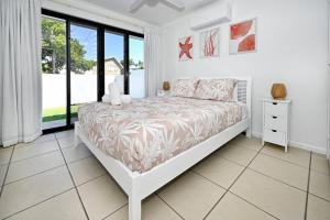 Ένα ή περισσότερα κρεβάτια σε δωμάτιο στο Mooloolaba Waterfront Luxury +18 φωτογραφίες