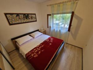 Postel nebo postele na pokoji v ubytování Apartments with parking spaces Icici, Opatija - 7763