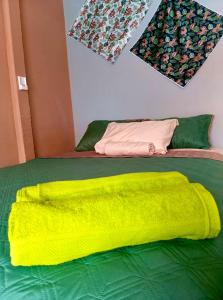 Postel nebo postele na pokoji v ubytování Habitaciones Kolibri