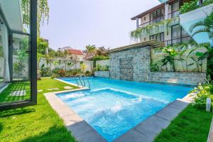 Bazén v ubytování Oriental Botanica Estate Vesta Collections nebo v jeho okolí