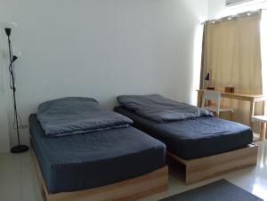 Postel nebo postele na pokoji v ubytování Baan7984 Rawai