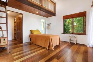 Ένα ή περισσότερα κρεβάτια σε δωμάτιο στο Villa Rosa