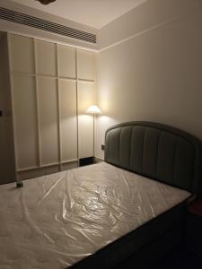 Postel nebo postele na pokoji v ubytování 四季小筑