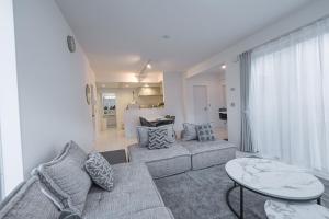 a living room with a couch and a table at Miyako Beach Resort in Hirara