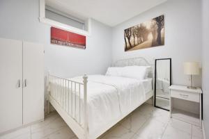Ένα ή περισσότερα κρεβάτια σε δωμάτιο στο Basement Suite In Vancouver