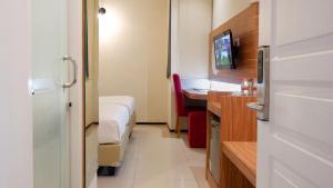 TV o dispositivi per l'intrattenimento presso Front One Resort Magelang