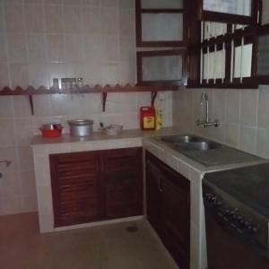 Η κουζίνα ή μικρή κουζίνα στο Daddy cool apartment
