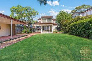 a large yard in front of a house at Greenwich Luxury near WharfTrainCBD steps to Sea in Sydney
