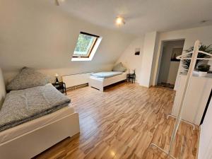 a room with a bed and a couch in it at Chic Apartments in idyllic location in Nierstein
