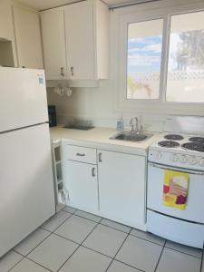 A kitchen or kitchenette at C2 Seaside Located in the Gated Community of Cruzan Princesse