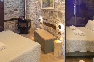 Stefanis Guest House II客房内的一张或多张床位