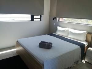 Ένα ή περισσότερα κρεβάτια σε δωμάτιο στο Beach Appartement contemporain