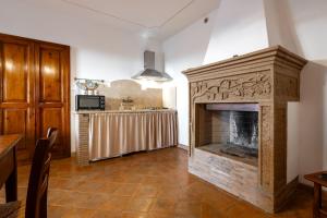 Køkken eller tekøkken på Agriturismo Poggio delle Conche