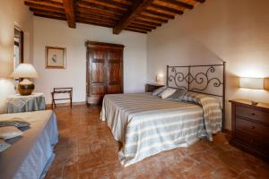 En eller flere senge i et værelse på Agriturismo Poggio delle Conche + 113 billeder