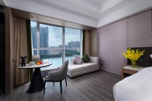 Posezení v ubytování Mehood Elegant Hotel Guangzhou Ersha Island Pearl River Night Tour - Complimentary Shuttle Bus between hotel to Canton Fair Complex during Canton Fair
