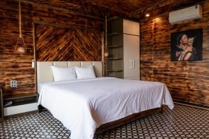 Postel nebo postele na pokoji v ubytování The Mong Garden Homestay SaPa
