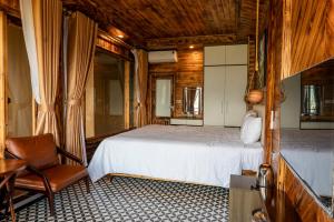 Postel nebo postele na pokoji v ubytování The Mong Garden Homestay SaPa