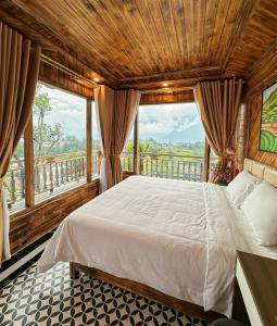 Postel nebo postele na pokoji v ubytování The Mong Garden Homestay SaPa