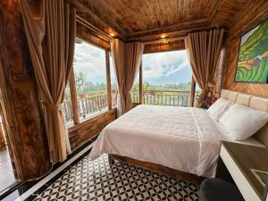 Postel nebo postele na pokoji v ubytování The Mong Garden Homestay SaPa