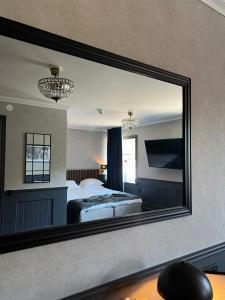 Postel nebo postele na pokoji v ubytování Central Hotellet Tierp