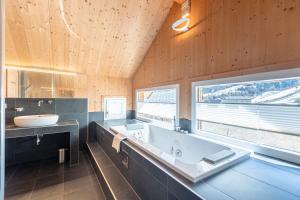 Kúpeľňa v ubytovaní Kreischberg Chalets by ALPS RESORTS