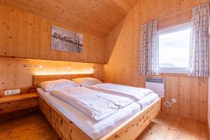 Posteľ alebo postele v izbe v ubytovaní Kreischberg Chalets by ALPS RESORTS