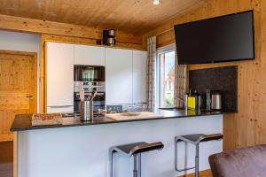 Kuchyňa alebo kuchynka v ubytovaní Kreischberg Chalets by ALPS RESORTS