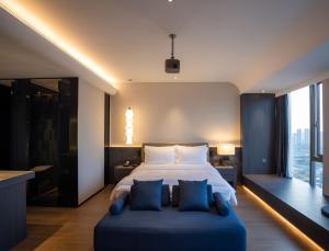 Postel nebo postele na pokoji v ubytování Maison New Century Hotel Cixi Hangzhou Bay
