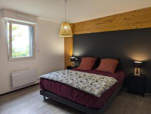 Gîte Clémathite客房内的一张或多张床位