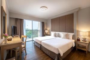 Postel nebo postele na pokoji v ubytování Kantary Bay Hotel And Serviced Apartment Rayong