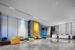 Area soggiorno di Hampton By Hilton Shenzhen Futian Mangrove Park Apartments