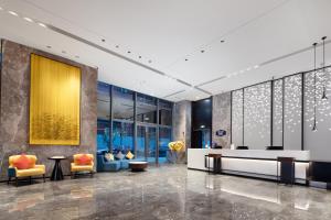 Area soggiorno di Hampton By Hilton Shenzhen Futian Mangrove Park Apartments