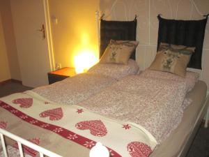 Postel nebo postele na pokoji v ubytování Chalet Catton Four bedroom appartement near Bad Kleinkirchheim