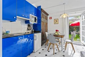 Kuchyň nebo kuchyňský kout v ubytování Apartamento 4