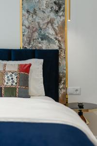 Postel nebo postele na pokoji v ubytování AWA Residence + 34 fotografií