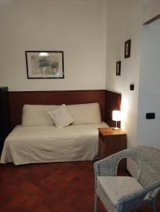Ένα ή περισσότερα κρεβάτια σε δωμάτιο στο RESIDENCE LA GAGGIANESE +17 φωτογραφίες