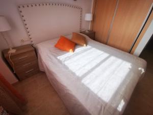 Postel nebo postele na pokoji v ubytování Meerblick Casares del Sol