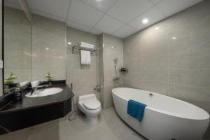 Koupelna v ubytování SQ Hang Gai hotel & Spa